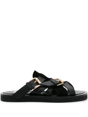 Moschino buckled suede slides - Black