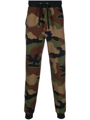 Moschino camouflage-pattern cotton track pants - Green