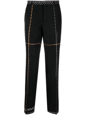 Moschino contrast-stitching virgin wool trousers - Black
