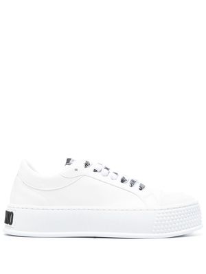 Moschino embossed-logo faux-leather sneakers - White