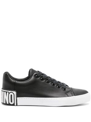 Moschino embossed-logo leather trainers - Black