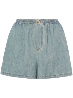 Moschino faded-denim shorts - Blue