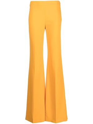 Moschino flared high-waist trousers - Yellow
