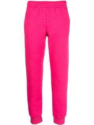 Moschino jacquard logo-motif track pants - Pink