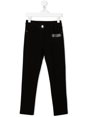 Moschino Kids embellished-logo detail trousers - Black