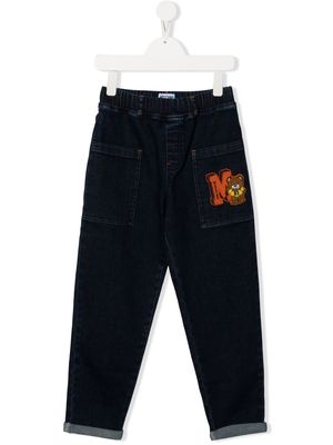 Moschino Kids logo-patch tapered jeans - Blue