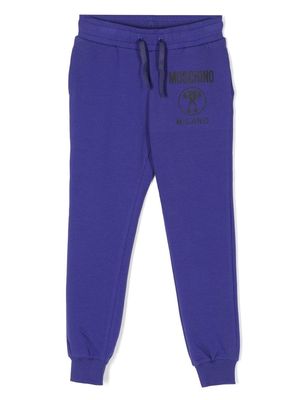 Moschino Kids logo-print drawstring track pants - Purple