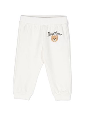 Moschino Kids logo-print fleece track trousers - White