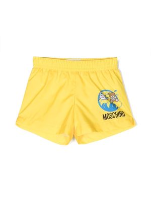 Moschino Kids logo-print slip-on swim shorts - Yellow