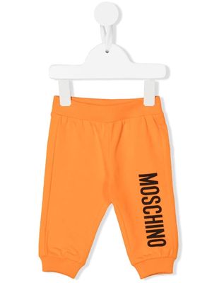 Moschino Kids logo-print tracksuit bottoms - Orange