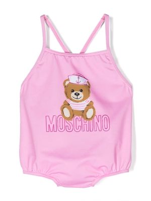 Moschino Kids Teddy Bear crossover-straps one-piece - Pink