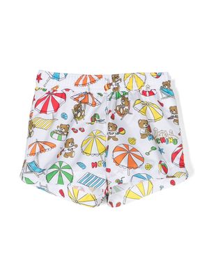 Moschino Kids Teddy Bear-print elasticated-waistband swim shorts - White