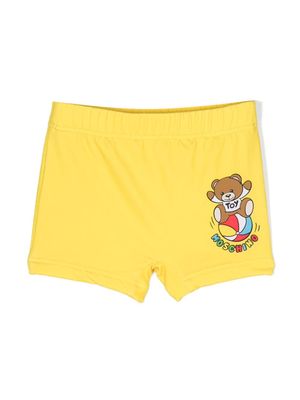 Moschino Kids Teddy Bear-print swim trunks - Yellow
