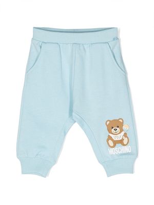 Moschino Kids Teddy-Bear print trousers - Blue