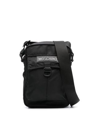 Moschino logo-appliqué shoulder bag - Black