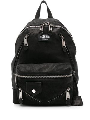 Moschino logo-appliqué suede backpack - Black