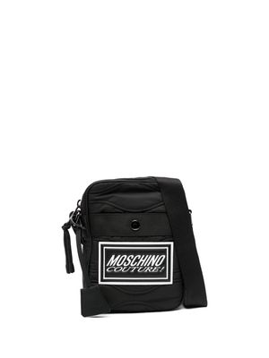 Moschino logo-debossed messenger bag - Black