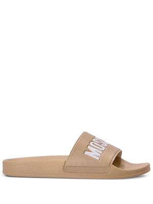 Moschino logo-embossed moulded-footbed slides - Neutrals