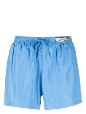 Moschino logo hardware swim shorts - Blue