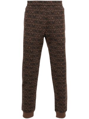 Moschino logo-jacquard track pants - Brown