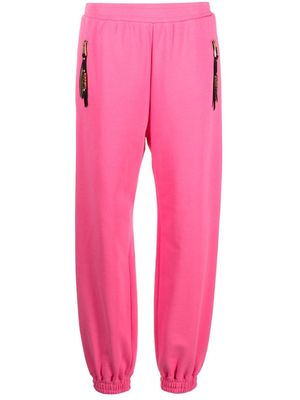 Moschino logo-lettering jersey track pants - Pink