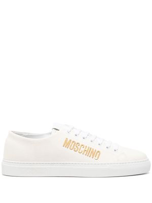 Moschino logo-lettering lace-up sneakers - White