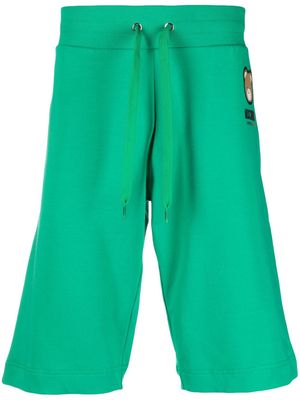 Moschino logo-patch bermuda shorts - Green