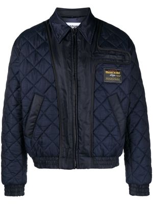 Moschino logo-patch quilted lightweight jacket - Blue