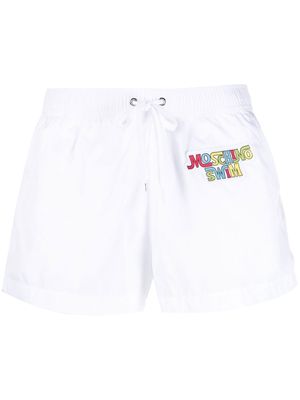 MOSCHINO logo-patch swim shorts - White