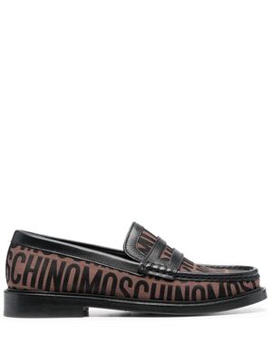 Moschino logo-pattern loafers - Black