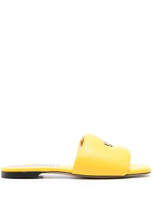 Moschino logo-plaque flat leather sandals - Yellow
