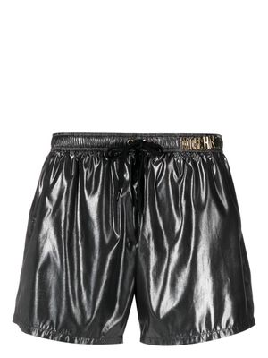 Moschino logo-plaque metallic beach shorts - Black