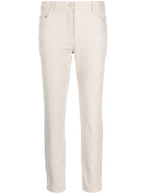 Moschino logo-print cotton-blend tapered trousers - Neutrals