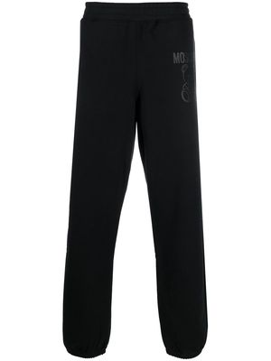 Moschino logo-print detail trousers - Black
