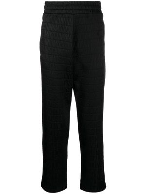 Moschino logo-print trousers - Black