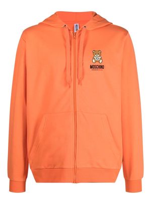 Moschino logo-print zipped hoodie - Orange