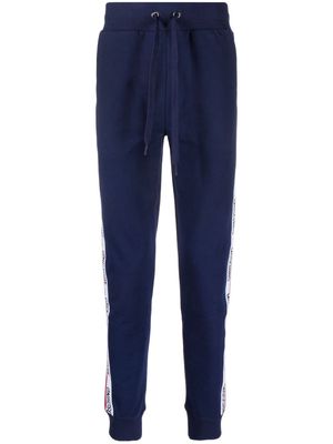 Moschino logo-tape detail stretch-cotton track pants - Blue