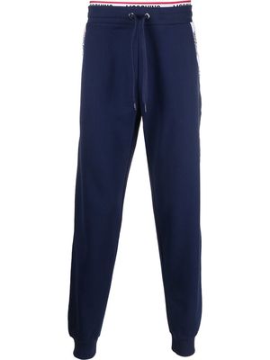 Moschino logo-waistband trousers - Blue