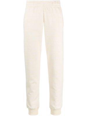 Moschino monogram-jacquard cotton blend track pants - Yellow
