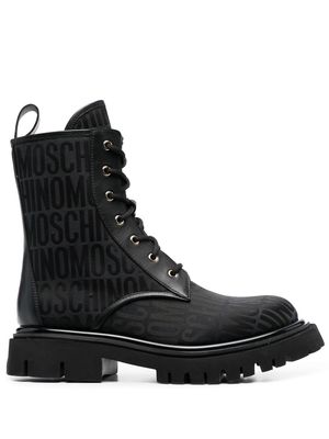 Moschino monogram-pattern lace-up boots - Black