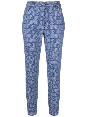 Moschino monogram-print skinny jeans - Blue
