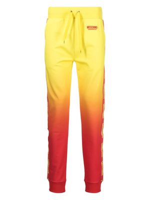 Moschino ombré-effect track pants - Yellow