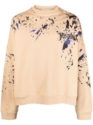 Moschino paint-splatter logo-print sweatshirt - Neutrals