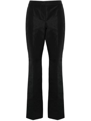 Moschino patch-detail trousers - Black