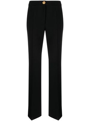 Moschino pressed-crease button-fastening tailored trousers - Black