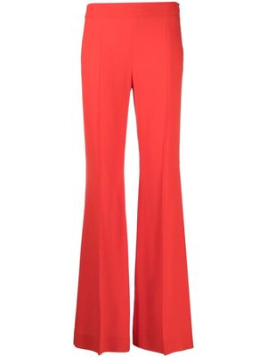Moschino pressed-crease flared trousers