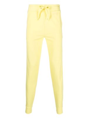 Moschino raised-logo logo-tape trackpants - Yellow