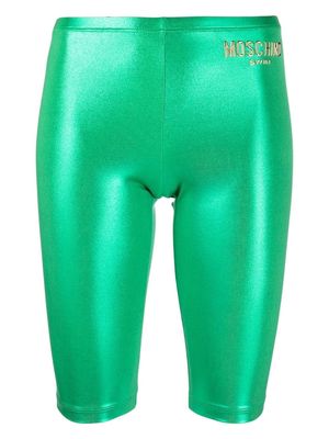 Moschino raised logo-print shorts - Green