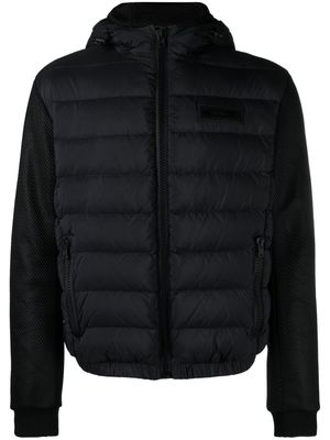 Moschino rubberised-logo puffer jacket - Black
