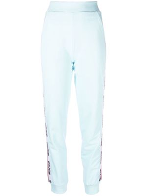 Moschino side logo-print detail trousers - Blue